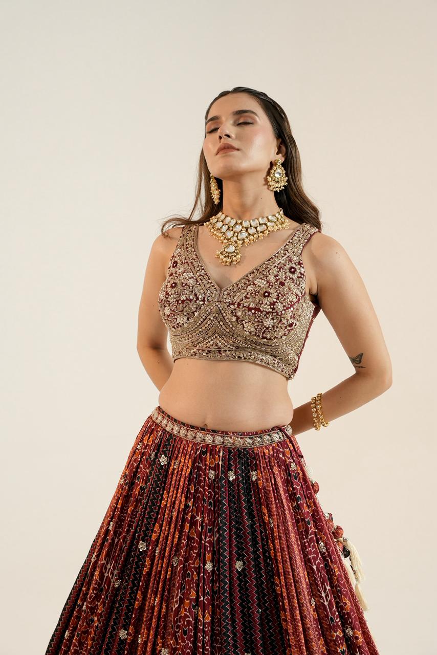 Pure Ajrakh Lehenga paired with a beautifully hand-worked blouse.
Luxury finishing