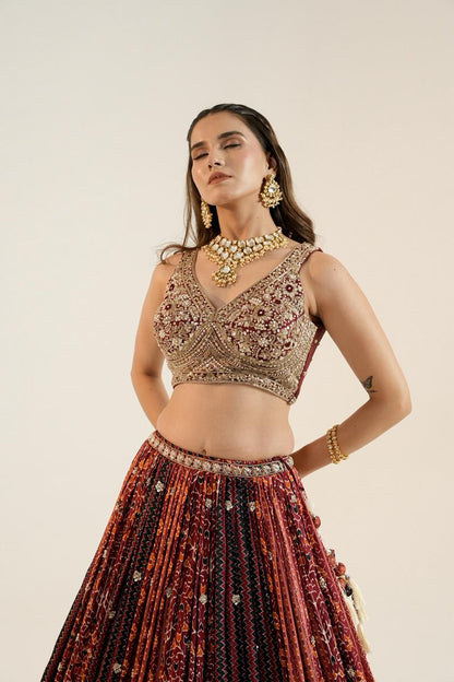 Pure Ajrakh Lehenga paired with a beautifully hand-worked blouse.
Luxury finishing