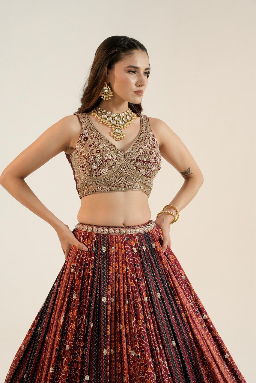 Pure Ajrakh Lehenga paired with a beautifully hand-worked blouse.
Luxury finishing