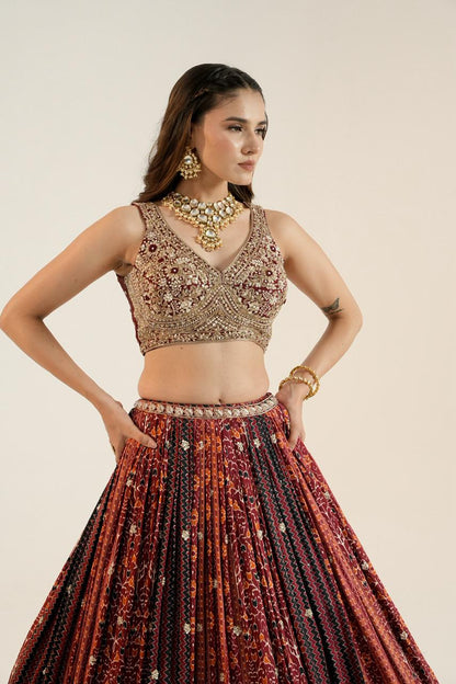 Pure Ajrakh Lehenga paired with a beautifully hand-worked blouse.
Luxury finishing