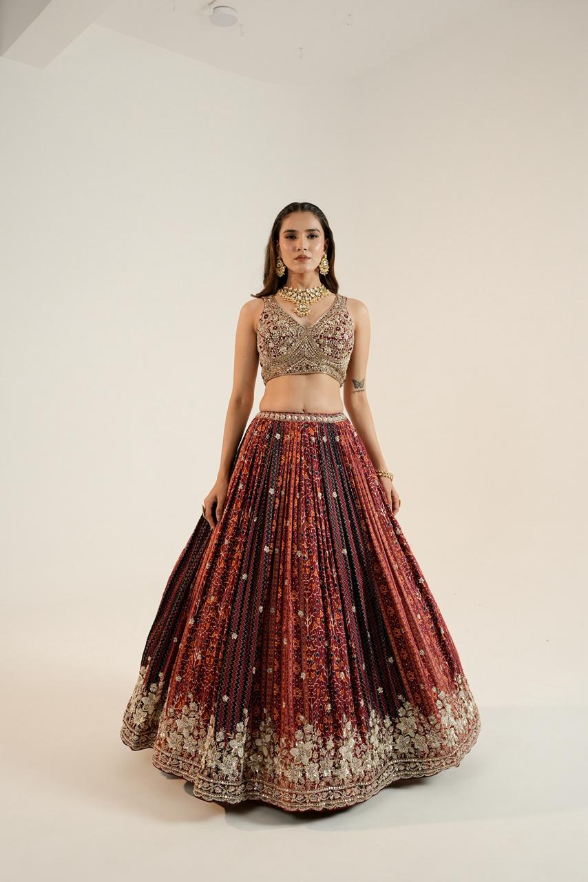 Pure Ajrakh Lehenga paired with a beautifully hand-worked blouse.
Luxury finishing