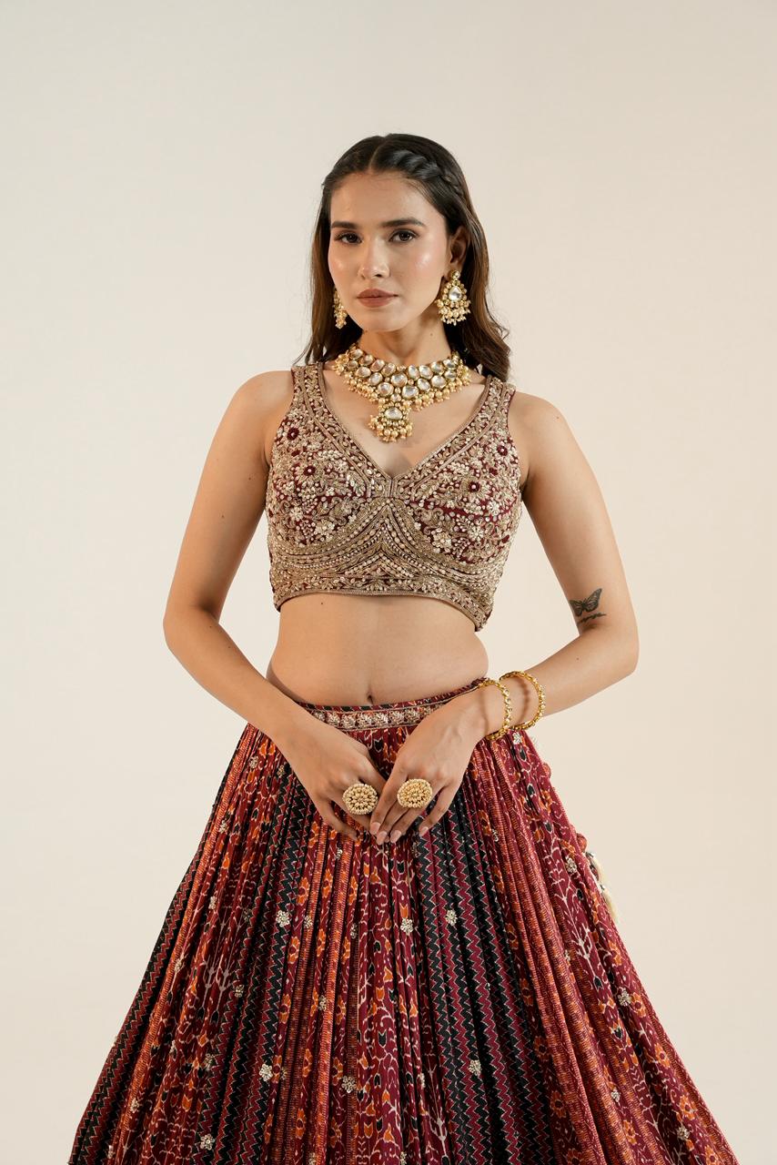 Pure Ajrakh Lehenga paired with a beautifully hand-worked blouse.
Luxury finishing
